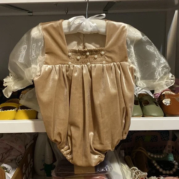 It’s not from Petit Maison Kids, romper 12-18 months.